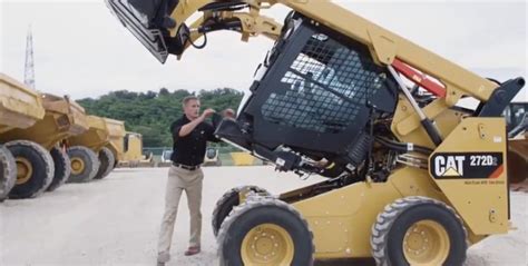 how to lift the cab on a cat skid steer|cat e series skid steer cab.